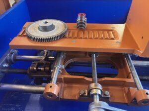 View of the vise and carriage of an 18" Frantom Slab Saw showing early vintage super Duty brass split nut
